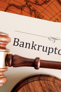 Judges gavel resting on bankruptcy filing